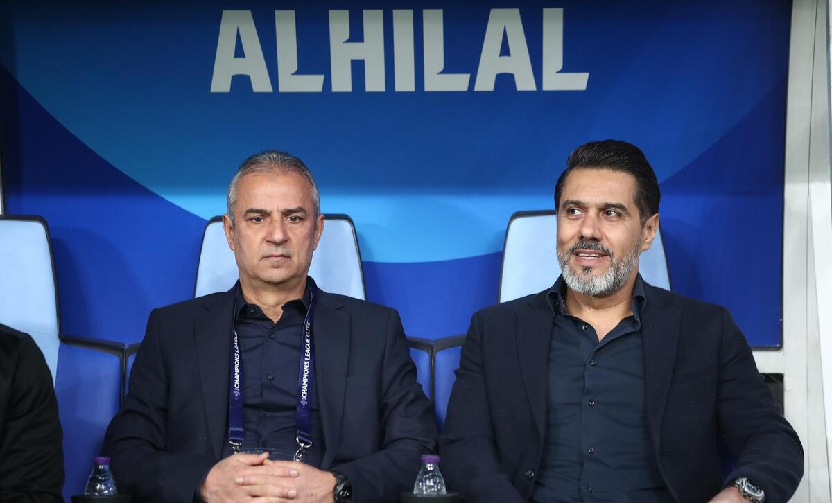 عکس از اسماعیل کارتال و افشین پیروانی سرمربی و سرپرست پرسپولیس